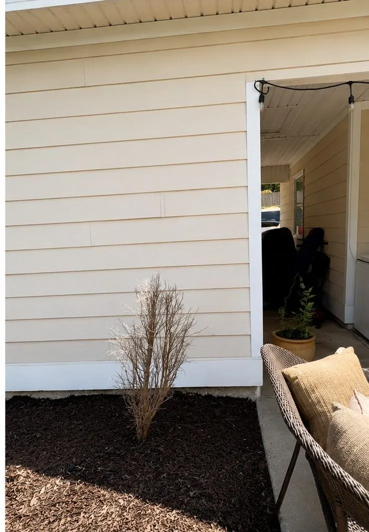 After cleaning by East Alabama Surface Clean. House siding and breezeway, dirty then soft washed