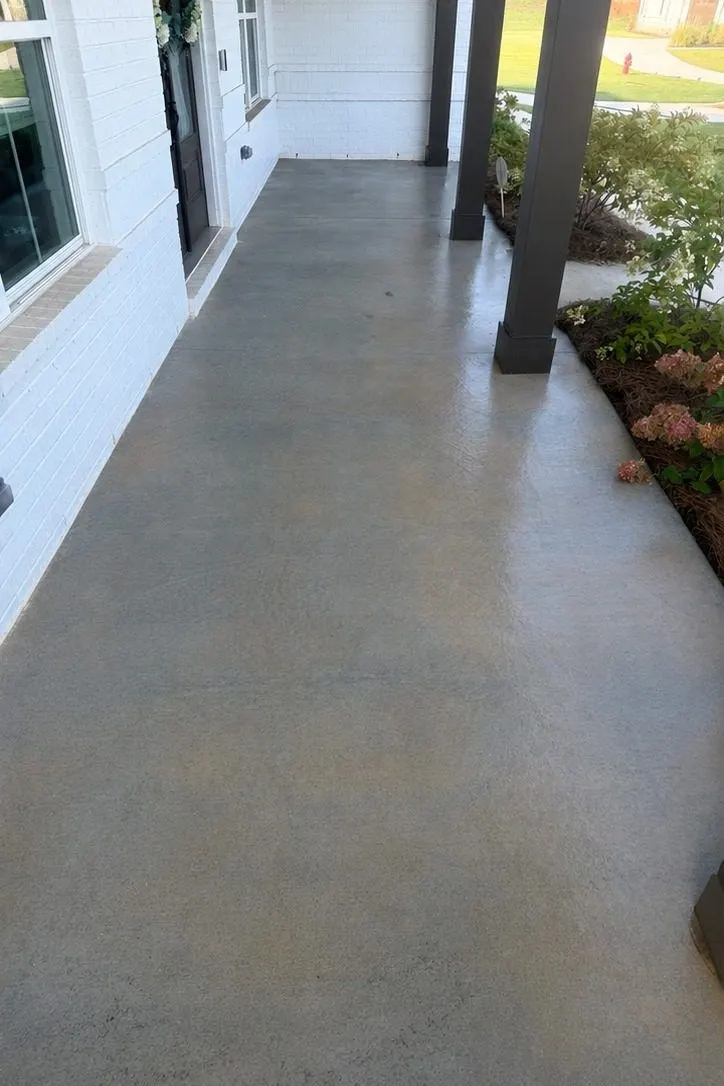 After cleaning by East Alabama Surface Clean. Covered concrete walkway stained orange with red clay, then cleaned